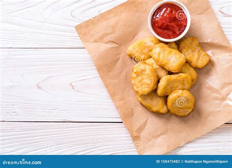 Chicken nuggets with sauce stock photo. Image of tomato - 150473482