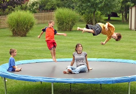 Kids On Trampoline Stock Image - Image: 1244531