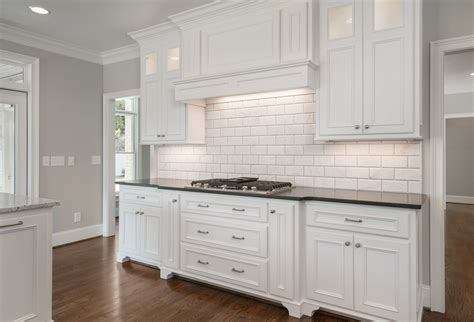 Love this all white kitchen with beautiful white subway tile backsplash! | White kitchen, All ...