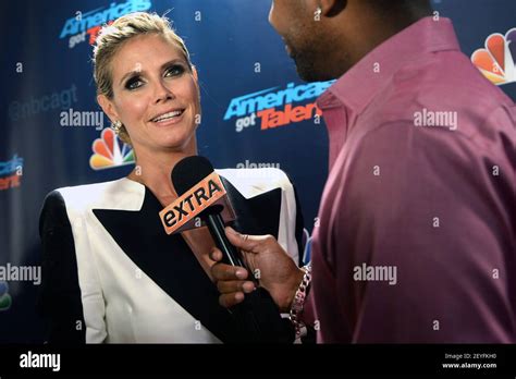 Heidi Klum (L) being interview by A.J. Calloway at 'America's Got Talent' Season 8 Post-Show Red ...