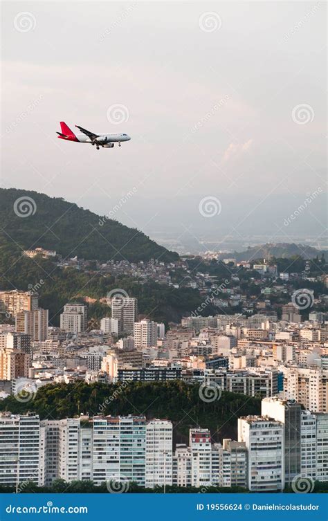 Plane landing at sunset stock photo. Image of vehicle - 19556624