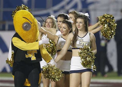 Georgia Tech mascot "Buzz," left, and cheerleaders... Photo-7378753. ...