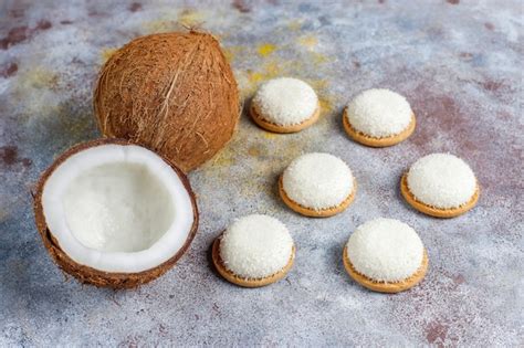 Premium Photo | Coconut marshmallow cookies with half coconut,top view