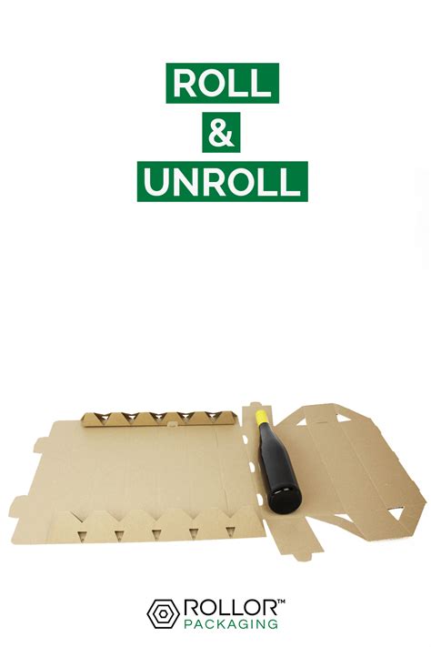 the roll and unroll tool is laying on top of cardboard