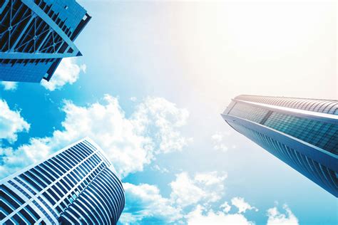 Fish Eye View Photo of Glass High Story Building over White Cloudy Sky ...