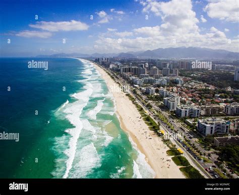 Drone photo of Barra da Tijuca beach, Rio de Janeiro, Brazil. We can see the beach, some ...