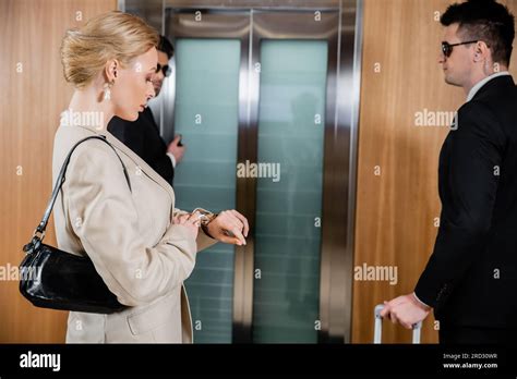 bodyguard service, personal safety, blonde woman in formal wear ...