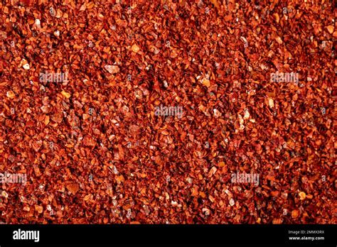 Red pepper flakes. Heap of crushed peppers. Top view of dried chili ...