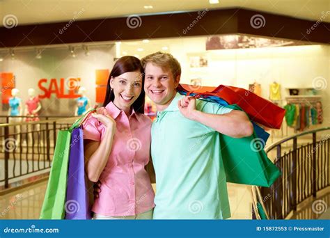 Couple of shopaholics stock image. Image of happy, glad - 15872553