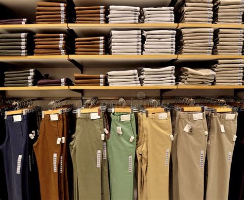 Pants display on shelf stock image. Image of sale, showing - 47119433