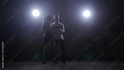 Young couple dancing bachata indoors Stock Video | Adobe Stock