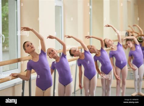 Girls training at classical ballet class Stock Photo - Alamy