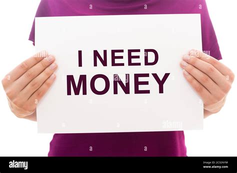 Girl holding white paper sheet with text I need money Stock Photo - Alamy