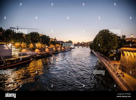Dawn on a cloudy morning in Paris, France with Ile de la Cite and Pont ...