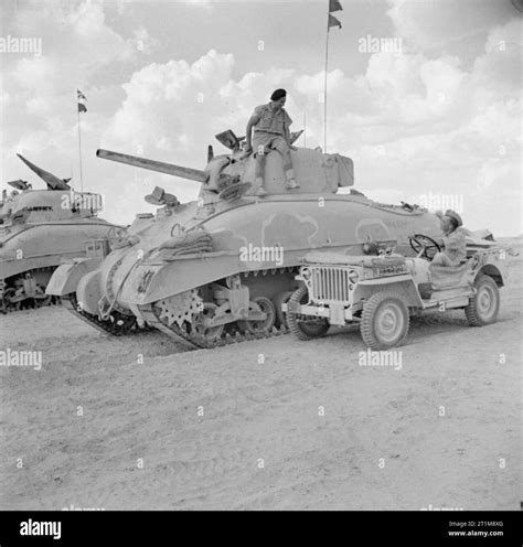 The British Army in North Africa 1942 A jeep and Sherman tanks of HQ ...