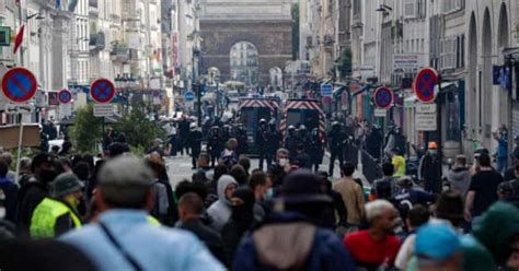France celebrates Bastille Day amid protests against Macron's mandatory ...