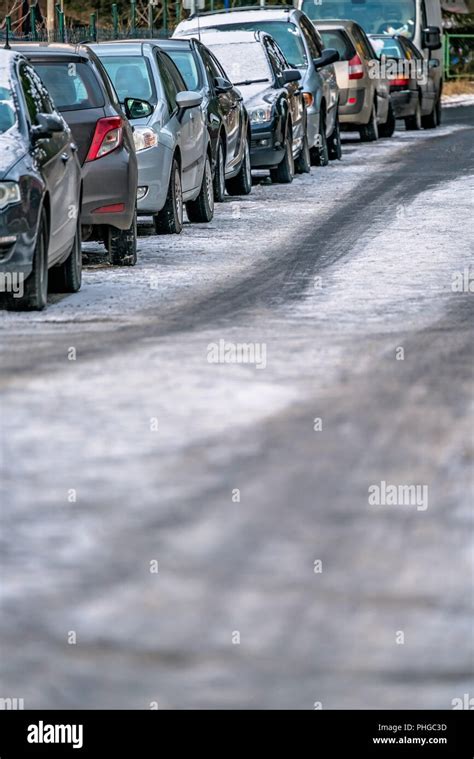 Cars parked on pavement pedestrians hi-res stock photography and images ...