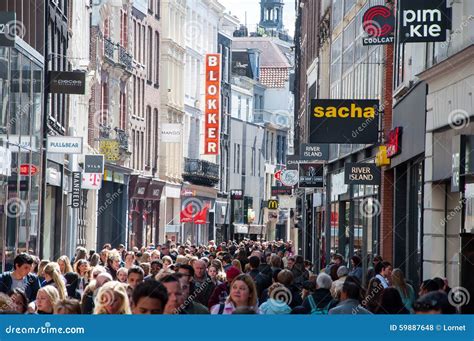 AMSTERDAM-APRIL 30: Kalverstraat Shopping Street in the Midday, People ...