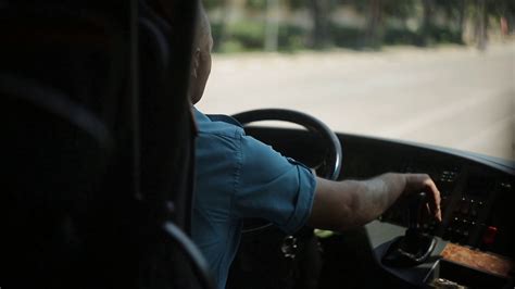 The Bus Driver Is Driving Along Road Stock Footage SBV-324038921 ...
