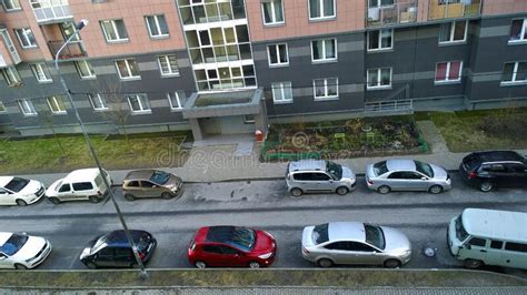 Cars Parked Along Road Near Apartment Building. Comfortable Housing ...