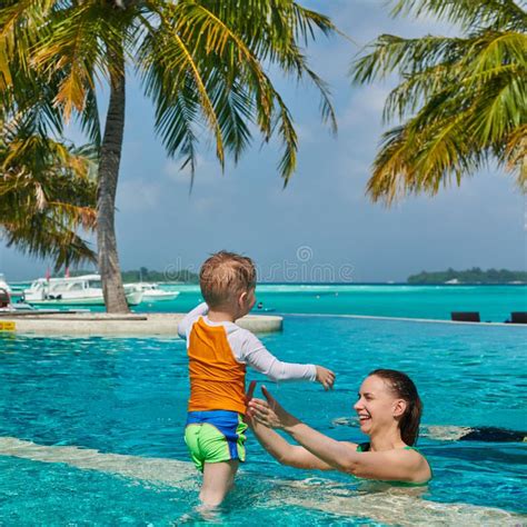 Toddler Boy in Resort Swimming Pool with Mother Stock Image - Image of ...