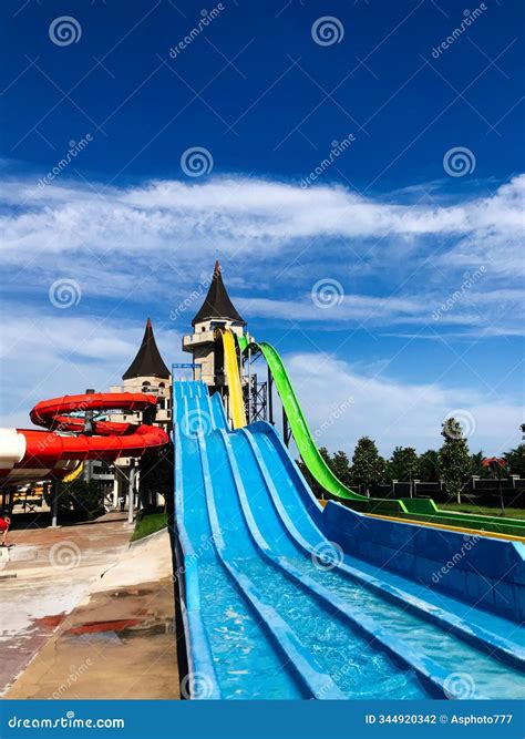 Colorful Water Slides at a Vibrant Outdoor Amusement Park Stock Photo ...