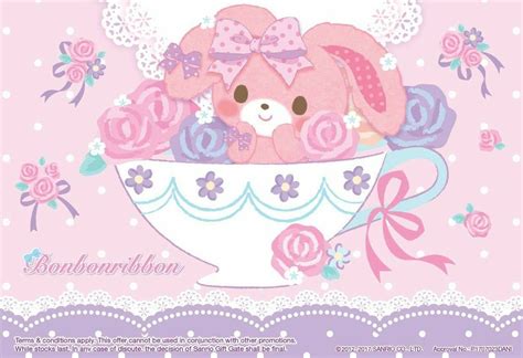 a pink card with a cute bunny in a teacup filled with flowers and ribbons