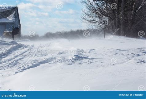 Blowing, Drifting Snow Across a Country Road Stock Photo - Image of ...