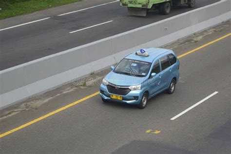 Blue Bird Taxi (Toyota Transmover) Editorial Photography - Image of ...