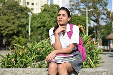 Cute Colombian Girl Student Deciding Sitting Stock Image - Image of ...