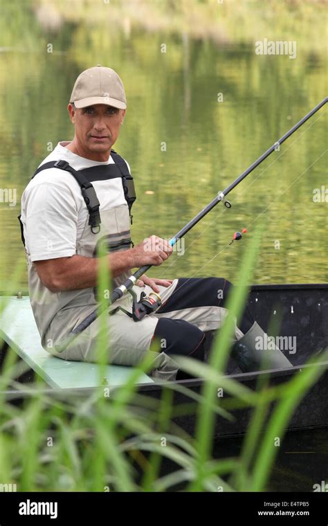 Fisherman in dungarees fishing boat hi-res stock photography and images ...