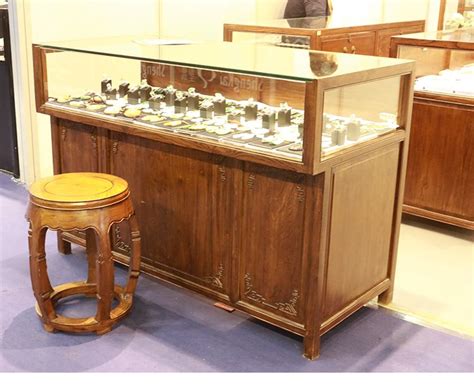 vintage jewellery display cabinets with chair Luxury Jewelry Display ...