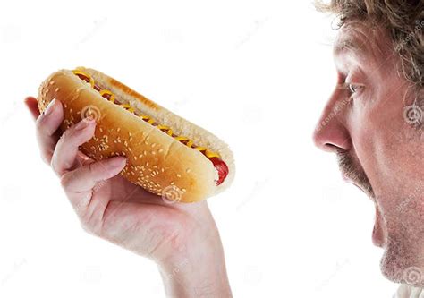 Hungry Man with Hot Dog stock image. Image of open, food - 9355811