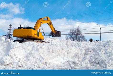 Excavator clearing snow stock image. Image of scoop, excavator - 51381413