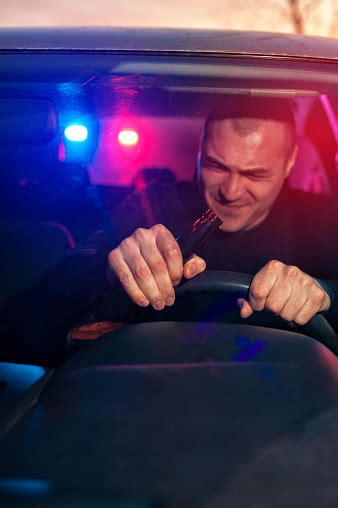 Drunk Driver In Car Chased By Police Stock Photo - Download Image Now ...