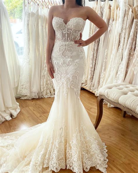 Fitted mermaid style wedding dress with a sweetheart neckline, corset ...