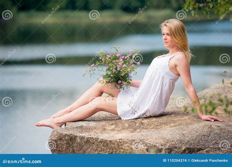 Young Beautiful Girl Relaxing on Nature and Enjoying the View, W Stock ...