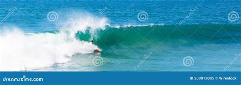 Surfer Surfing on Crazy Sea Waves on a Sunny Day Stock Image - Image of ...