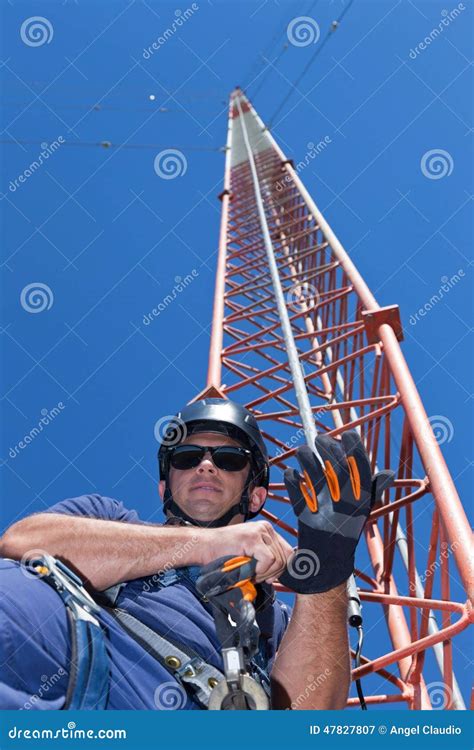 Climber Puts Safety Equipment of before Climbing Tower Stock Image ...