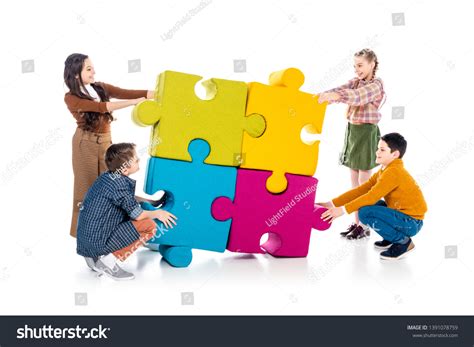 Happy Kids Playing Jigsaw Puzzle Pieces Stock Photo 1391078759 ...