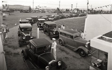 Long line of cars wait to enter the first drive-in theater in Los ...