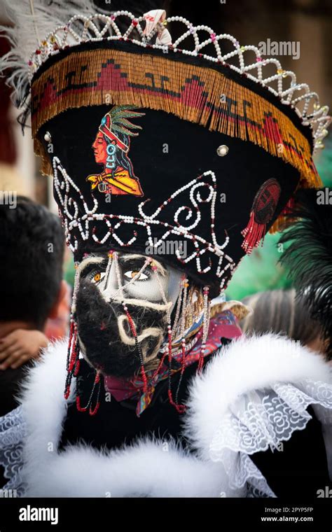 Chinelos are a traditional colorful costumed dancer in carnaval, is ...