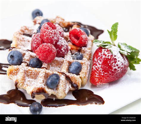 Waffles With Syrup And Fruit