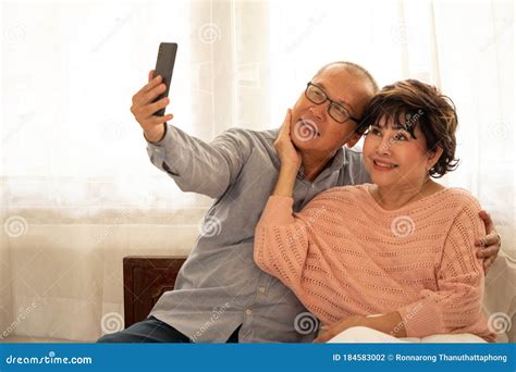 Happy Couples Taking Photos Together in the House Stock Photo - Image ...