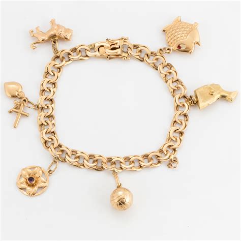 CHARM BRACELET, 18K gold. - Bukowskis