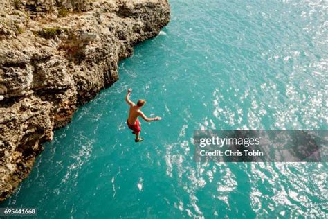 2,234 Jump Cliff Into Water Stock Photos, High-Res Pictures, and Images ...
