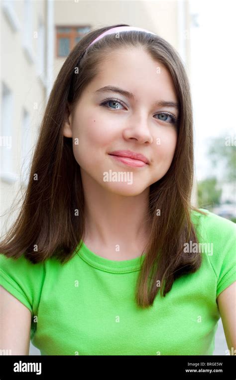 young beautiful european girl looks into camera Stock Photo - Alamy