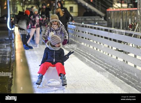 Little sisters Ice skating in Varazdin during winter holidays, Croatia ...