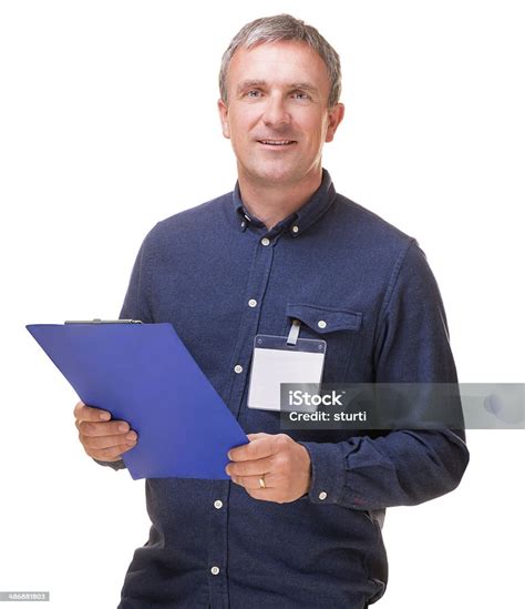 Clipboard Man Stock Photo - Download Image Now - Men, Clipboard, Blue ...