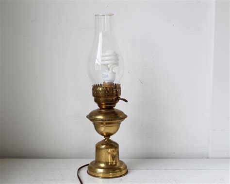 Brass hurricane lamp - created to keep a lamp's flame from blowing out ...